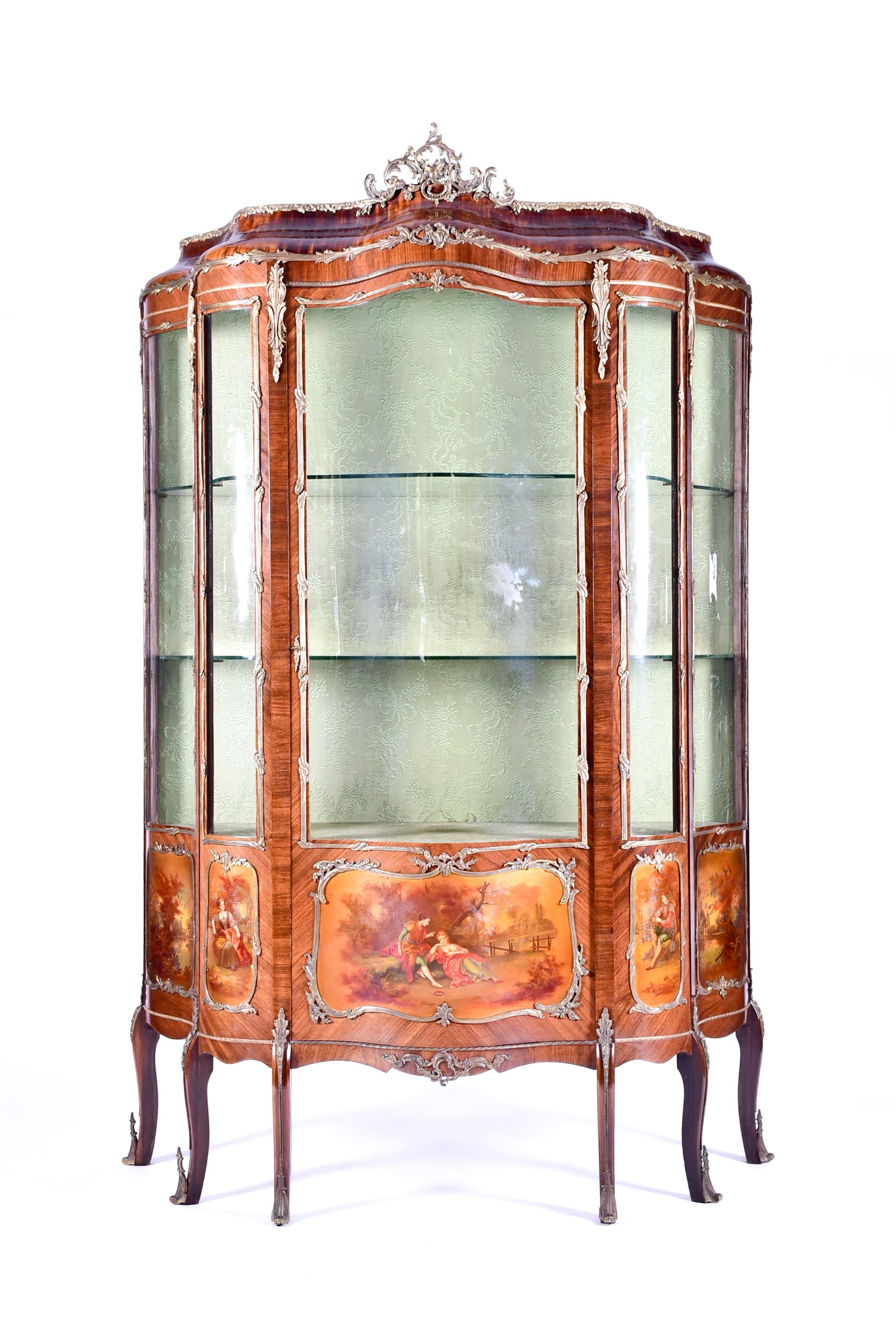 A large Louis XV style serpentine front kingwood vitrine cabinet