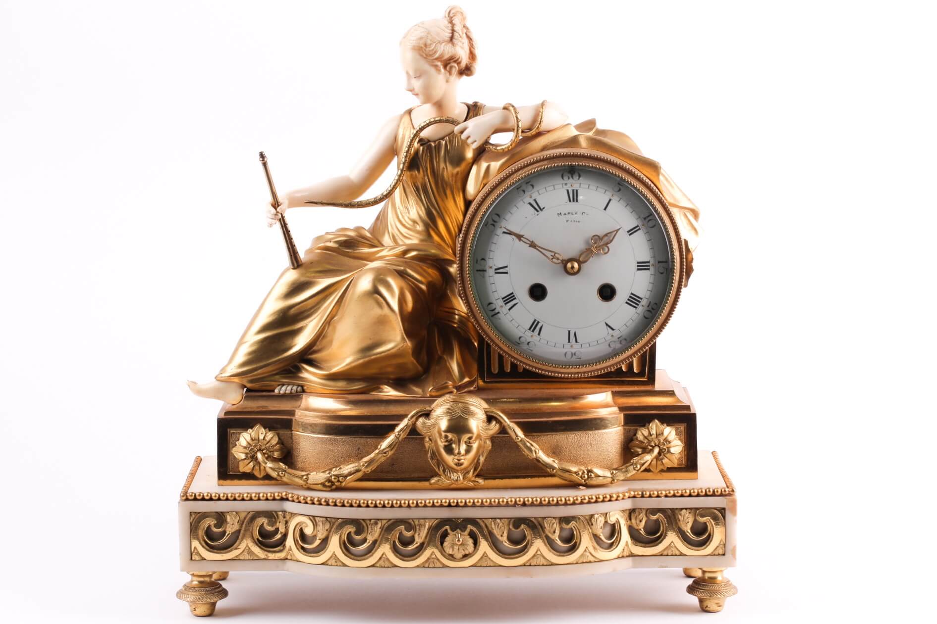 A fine and unusual 19th-century white marble, ivory and ormolu mantel clock