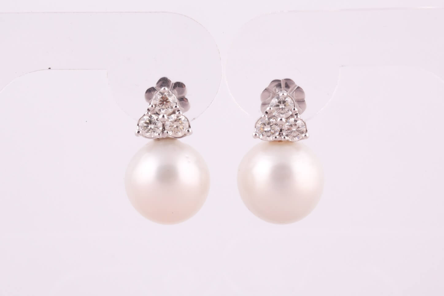 A pair of South Sea pearl and diamond stud earrings