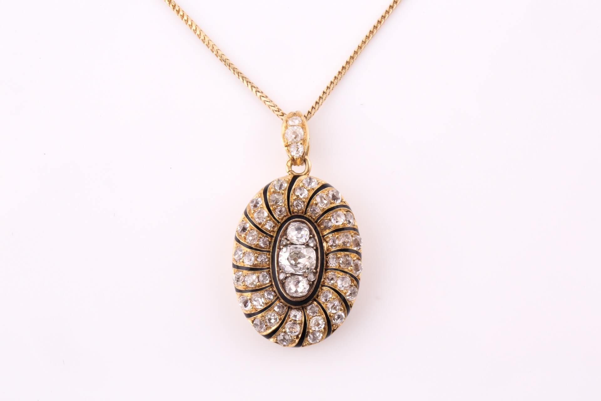 A late 19th century French oval locket/pendant