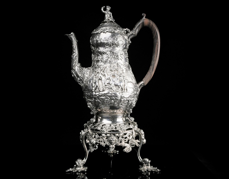 A George IV fine silver coffee pot on conforming stand