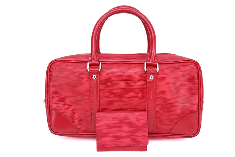 A Louis Vuitton red epi-leather handbag 