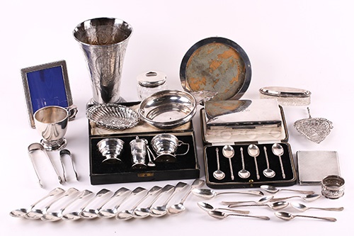 A collection of silver and white metal