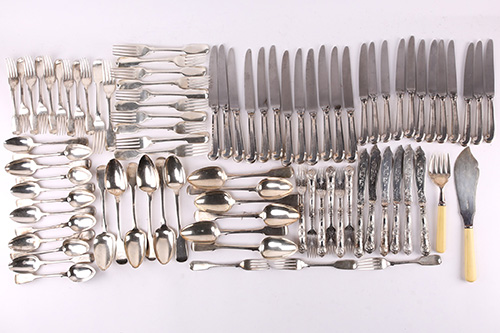 A collection of silver cutlery