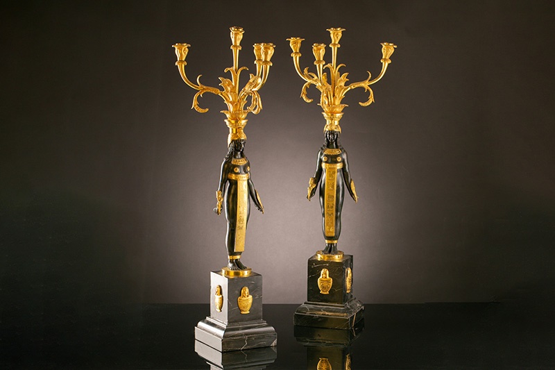 A fine pair of Retour D’ Egypte ormolu and patinated bronze four sconce candelabra