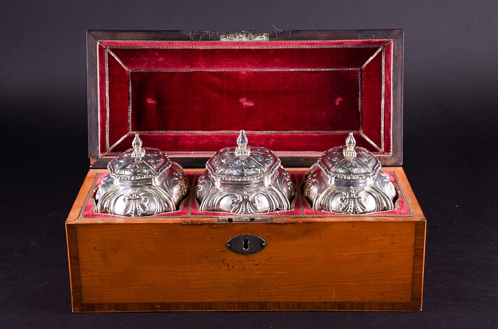 A set of three early George III silver tea caddies