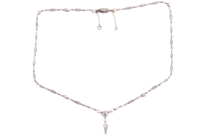 An Art Deco chain necklace set with pearls and old-cut diamonds