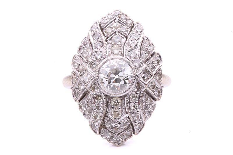 An Edwardian diamond panel ring