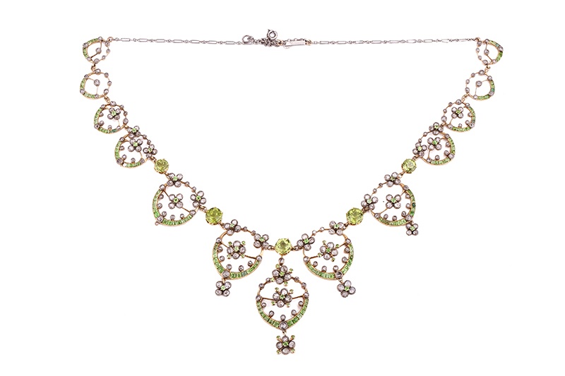 An Edwardian diamond, peridot and demantoid garnet necklace