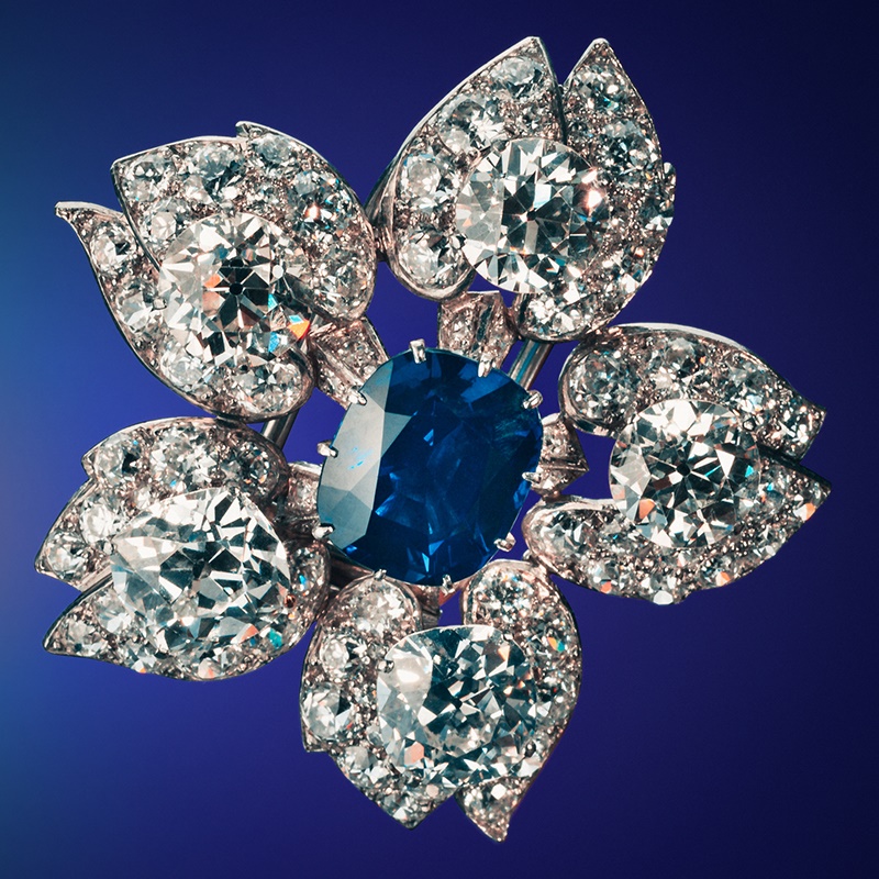A Cartier Kashmir Sapphire & Diamond Flower Brooch