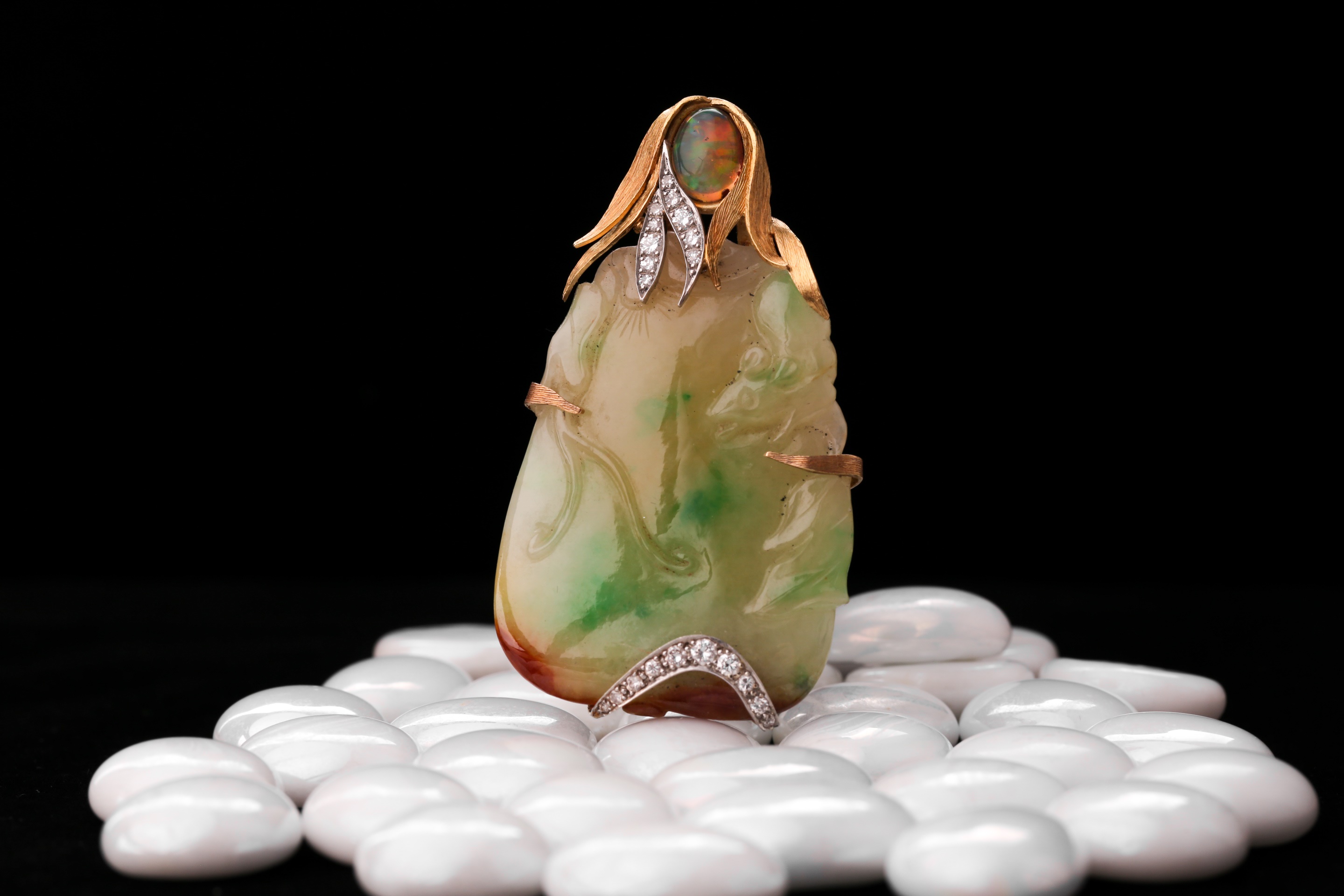 Andrew Grima. 18ct yellow gold, diamond, jade, and opal pendant.