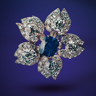 A Cartier Kashmir Sapphire and Diamond brooch