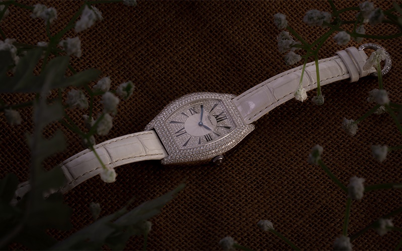Chopard diamond set watch with pink strap