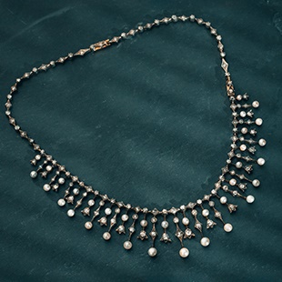 An Edwardian diamond and pearl necklace
