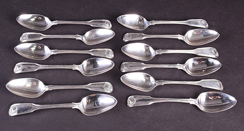 A set of twelve George III silver dessert spoons