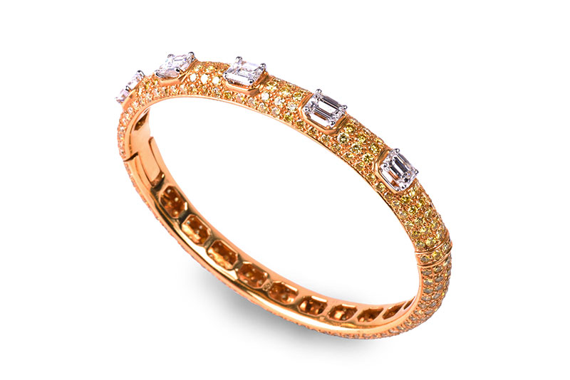 A Graff 18ct yellow gold and diamond bangle