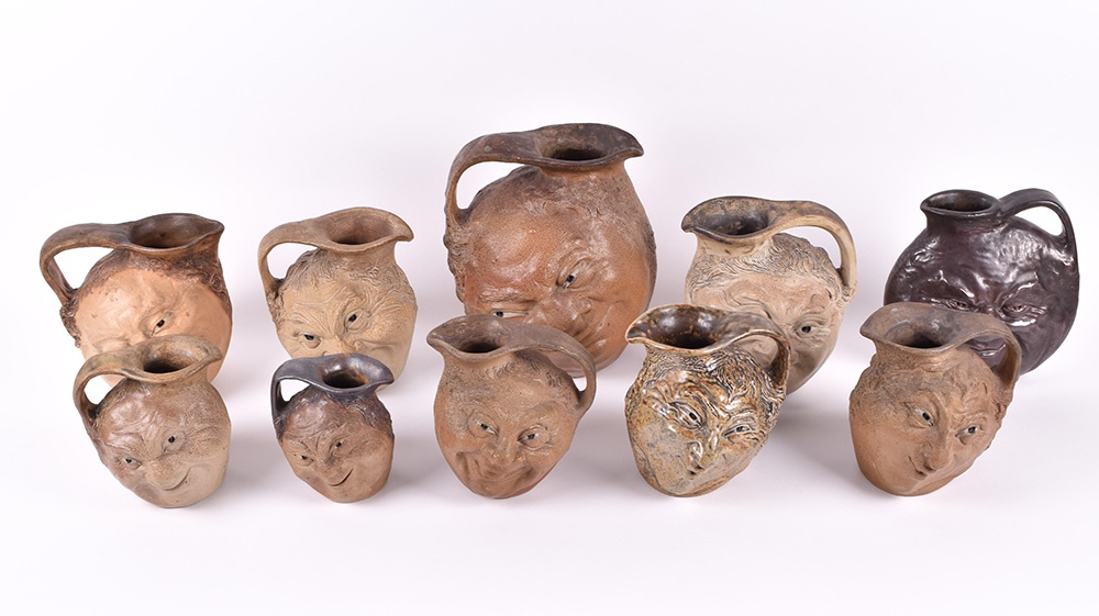 a collection of Martin brothers jugs