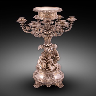 A George III Silver Candelabra