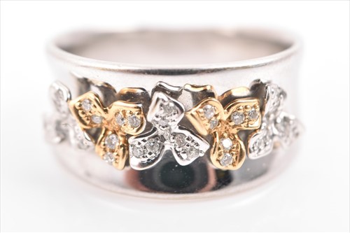 Lot 740 - An 18ct white gold and diamond ring the...
