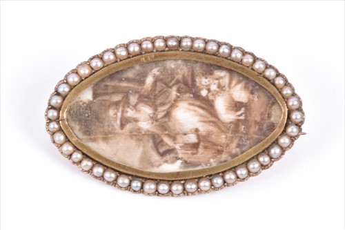 Lot 629 - A 19th century yellow metal portrait brooch...