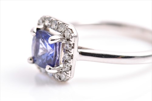 Lot 417 - An 18ct white gold, diamond, and tanzanite...
