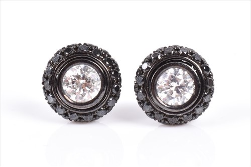 Lot 534A - A pair of 18ct black gold, and black and white...
