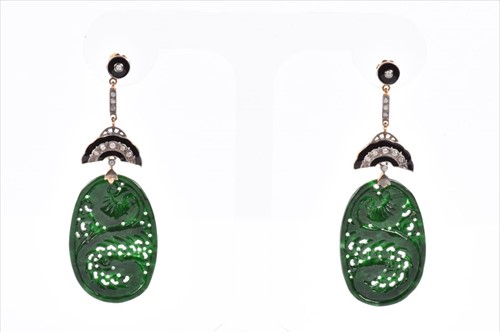 Lot 624 - A pair of silver gilt, diamond, onyx, and...