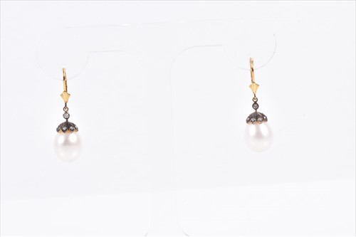 Lot 627 - A pair of silver gilt, diamond, and freshwater...