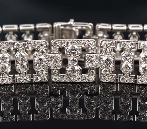 Lot 590 - Cartier, London. An Art Deco diamond bracelet...