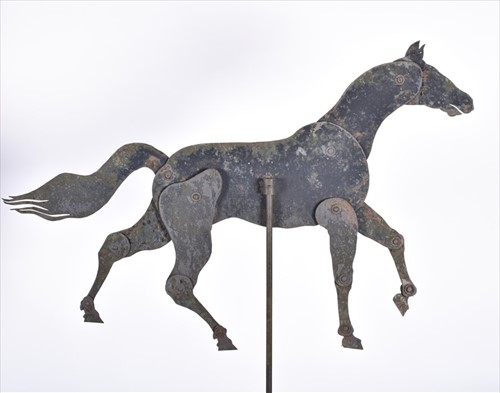 Lot 266 - A 19th century iron articulated horse on stand...