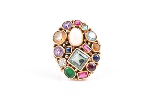 Lot 647 - An unusual yellow gold and multi-gem ring the...