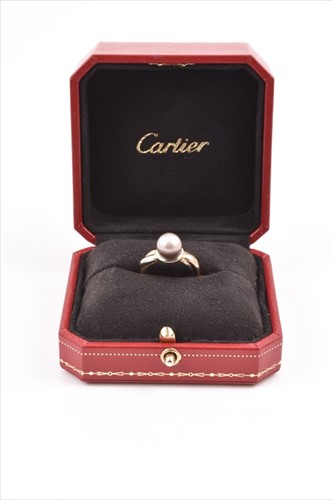 Lot 621 - A modified 18 carat gold Cartier trinity ring...
