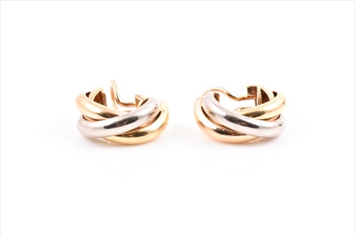 Lot 650 - Cartier. A pair of  18ct tri-coloured gold ear...