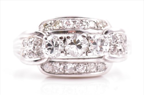 Lot 679 - An unusual diamond ring in the late Art Deco...