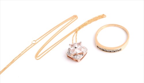 Lot 736 - A 9ct rose gold, diamond, and white zircon...