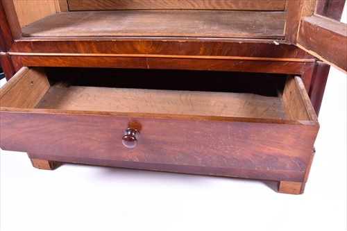 Lot 110 - A late Victorian mahogany glazed bookcase with...