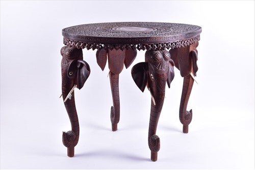 Lot 147 - An early 20th century Indian carved hardwood...