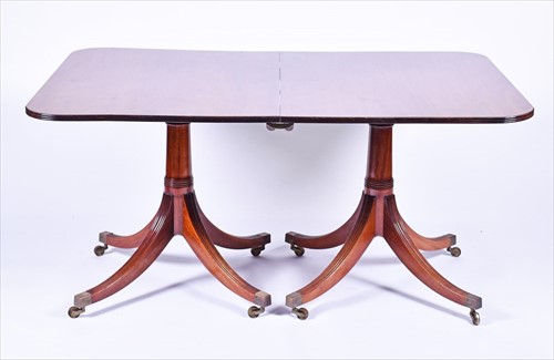 Lot 61 - A reproduction mahogany twin pedestal dining...