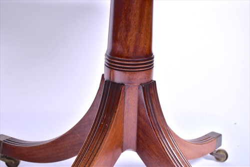 Lot 61 - A reproduction mahogany twin pedestal dining...