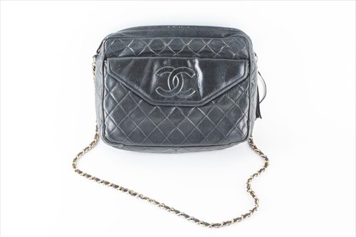 Lot 181 - Chanel. A vintage black quilted leather...