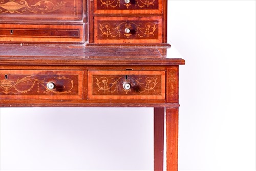 Lot 1 - An Edwardian mahogany inlaid writing desk by...