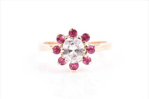 Lot 505 - A 14ct yellow gold, diamond and ruby cluster...