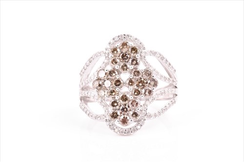 Lot 619 - An unusual 14ct white gold and diamond...