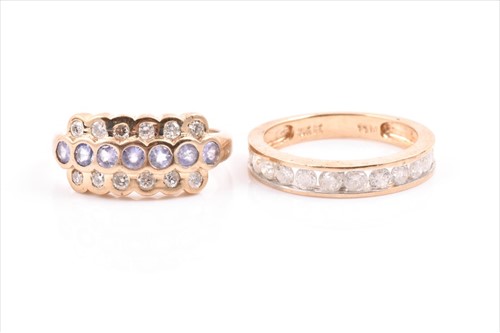 Lot 516 - A 9ct yellow gold, diamond, and pale blue...