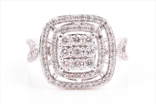 Lot 522 - A white metal and diamond cocktail ring the...