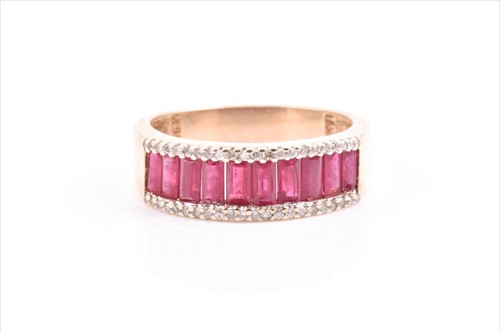 Lot 514 - A yellow metal, diamond, and ruby half...