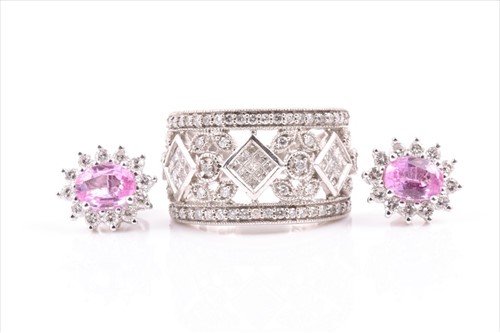 Lot 517 - A silver and diamond cocktail ring the...