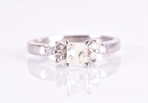 Lot 608 - A white metal and diamond ring set with a...