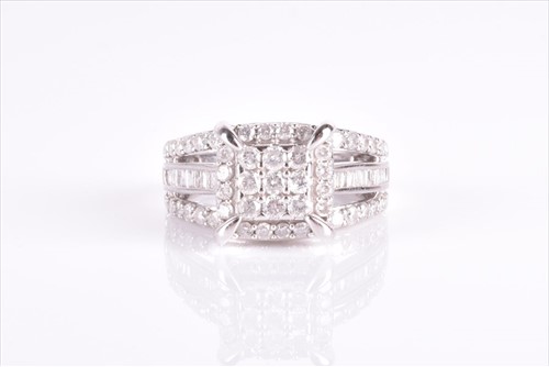 Lot 614 - A white gold and diamond cluster ring...