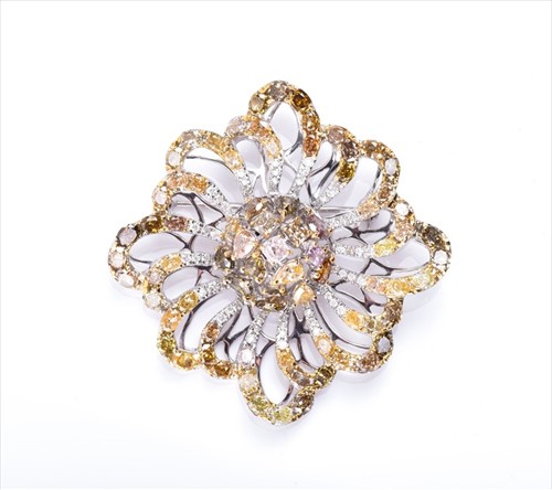 Lot 415 - A multi-coloured natural fancy diamond brooch...